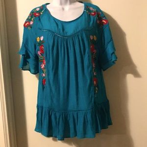 Umgee top, size medium. NWOT. Beautiful and festive, deep aqua blue.